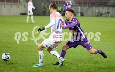 Fussball. Bundesliga. SK Austria Klagenfurt gegen Austria Wien.   Till Schumacher  (Austria Klagenfurt), Andreas Gruber     (Wien). Klagenfurt, 9.12.2023.
Foto: Kuess
---
pressefotos, pressefotografie, kuess, qs, qspictures, sport, bild, bilder, bilddatenbank