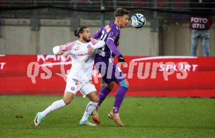 Fussball. Bundesliga. SK Austria Klagenfurt gegen Austria Wien.  Christopher Wernitznig   (Austria Klagenfurt),   Hakim Guenouche   (Wien). Klagenfurt, 9.12.2023.
Foto: Kuess
---
pressefotos, pressefotografie, kuess, qs, qspictures, sport, bild, bilder, bilddatenbank