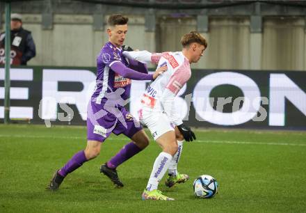 Fussball. Bundesliga. SK Austria Klagenfurt gegen Austria Wien.  Till Schumacher   (Austria Klagenfurt),   Muharem Huskovic   (Wien). Klagenfurt, 9.12.2023.
Foto: Kuess
---
pressefotos, pressefotografie, kuess, qs, qspictures, sport, bild, bilder, bilddatenbank