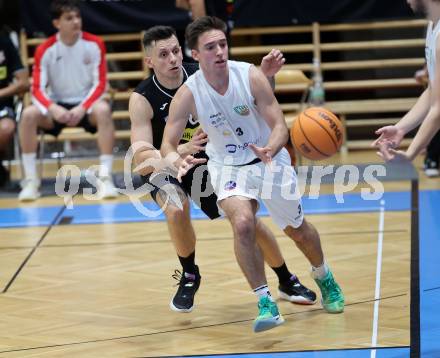 Basketball 2. Liga 2023/2024. Grunddurchgang 12. Runde.  KOS gegen Mattersburg Rocks.    Niklas Michel (KOS),  Petar Zivkovic  (Mattersburg Rocks). Klagenfurt, am 16.12.12023.
Foto: Kuess
www.qspictures.net
---
pressefotos, pressefotografie, kuess, qs, qspictures, sport, bild, bilder, bilddatenbank