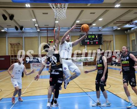 Basketball 2. Liga 2023/2024. Grunddurchgang 12. Runde.  KOS gegen Mattersburg Rocks.    Tim Huber (KOS),  Julian Alper  (Mattersburg Rocks). Klagenfurt, am 16.12.12023.
Foto: Kuess
www.qspictures.net
---
pressefotos, pressefotografie, kuess, qs, qspictures, sport, bild, bilder, bilddatenbank