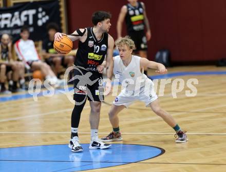 Basketball 2. Liga 2023/2024. Grunddurchgang 12. Runde.  KOS gegen Mattersburg Rocks.    Louis Heinrichs (KOS),  Julian Alper  (Mattersburg Rocks). Klagenfurt, am 16.12.12023.
Foto: Kuess
www.qspictures.net
---
pressefotos, pressefotografie, kuess, qs, qspictures, sport, bild, bilder, bilddatenbank