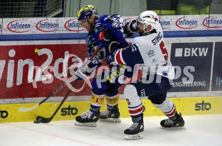 EBEL. Eishockey Bundesliga. EC VSV gegen Fehervar AV19.   John Hughes, (VSV),  Bence Stipsicz   (Fehervar). Villach, am 28.12.2023
Foto: Kuess
www.qspictures.net
---
pressefotos, pressefotografie, kuess, qs, qspictures, sport, bild, bilder, bilddatenbank