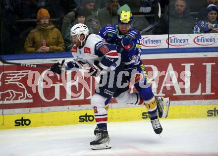 EBEL. Eishockey Bundesliga. EC VSV gegen Fehervar AV19.   Arturs Kulda,  (VSV),  Daniel Leavens  (Fehervar). Villach, am 28.12.2023
Foto: Kuess
www.qspictures.net
---
pressefotos, pressefotografie, kuess, qs, qspictures, sport, bild, bilder, bilddatenbank