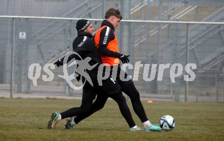 Fussball Bundesliga. Training SK Austria Klagenfurt.    Rico Benatelli, Jannik Robatsch. Klagenfurt, am 5.1.2024.
Foto: Kuess
www.qspictures.net
---
pressefotos, pressefotografie, kuess, qs, qspictures, sport, bild, bilder, bilddatenbank