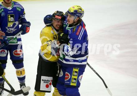 EBEL. Eishockey Bundesliga. EC VSV gegen spusu Vienna Capitals.  Dylan Macpherson, (VSV),  Leon Widhalm    (Vienna Capitals). Villach, am 9.1.2024.
Foto: Kuess
www.qspictures.net
---
pressefotos, pressefotografie, kuess, qs, qspictures, sport, bild, bilder, bilddatenbank