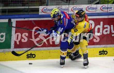 EBEL. Eishockey Bundesliga. EC VSV gegen spusu Vienna Capitals.  Andrew Desjardins,  (VSV),   Patrick Antal  (Vienna Capitals). Villach, am 9.1.2024.
Foto: Kuess
www.qspictures.net
---
pressefotos, pressefotografie, kuess, qs, qspictures, sport, bild, bilder, bilddatenbank