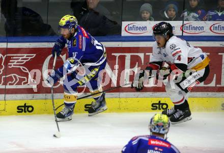 EBEL. Eishockey Bundesliga. EC VSV gegen BEMER Pioneers Vorarlberg.  Kevin Hancock, (VSV),    Clayton Kirichenko  (Vorarlberg). Villach, am 13.1.2024.
Foto: Kuess
www.qspictures.net
---
pressefotos, pressefotografie, kuess, qs, qspictures, sport, bild, bilder, bilddatenbank