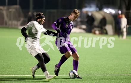 Fussball Testspiel. SK Austria Klagenfurt gegen ASK.   Nicolas Binder, (Klagenfurt),   Kyrylo Romaniuk (ASK). Klagenfurt, amm 17.1.2024.
Foto: Kuess
www.qspictures.net
---
pressefotos, pressefotografie, kuess, qs, qspictures, sport, bild, bilder, bilddatenbank