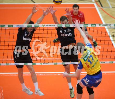 Volleyball. Powerfusion Volley League Men. SK Zadruga Aich/Dob gegen VBK Woerther-See-Loewen Klagenfurt.  Aleksander Grzegorczyk,   (Aich/Dob),  Jonas Emanuel Holzinger, Eric Stadie  (Worthersee Loewen). Bleiburg, am 27.1.2024.
Foto: Kuess
www.qspictures.net
---
pressefotos, pressefotografie, kuess, qs, qspictures, sport, bild, bilder, bilddatenbank