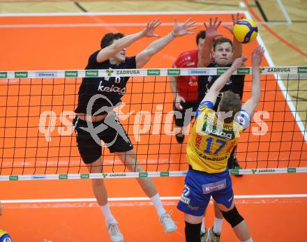 Volleyball. Powerfusion Volley League Men. SK Zadruga Aich/Dob gegen VBK Woerther-See-Loewen Klagenfurt.  Aleksander Grzegorczyk,  (Aich/Dob),   Jonas Emanuel Holzinger, Eric Stadie  (Worthersee Loewen). Bleiburg, am 27.1.2024.
Foto: Kuess
www.qspictures.net
---
pressefotos, pressefotografie, kuess, qs, qspictures, sport, bild, bilder, bilddatenbank