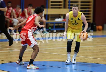 Basketball 2. Liga 2023/2024. Grunddurchgang 15. Runde.  Woerthersee Piraten gegen Upper Austrian Ballers.  Jernej Andolsek Heine  (Piraten),  Samuel Gatterbauer  (Upper Austrian Ballers).   Klagenfurt, am 28.1.2024
Foto: Kuess

---
pressefotos, pressefotografie, kuess, qs, qspictures, sport, bild, bilder, bilddatenbank