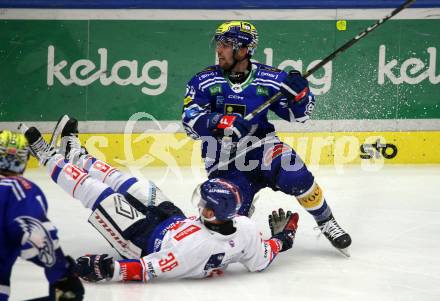 EBEL. Eishockey Bundesliga. EC VSV gegen HC TIWAG Innsbruck. Tyler Ryan Steenbergen,   (VSV),   Dario Winkler (Innsbruck). Villach, am 21.2.2024.
Foto: Kuess
www.qspictures.net
---
pressefotos, pressefotografie, kuess, qs, qspictures, sport, bild, bilder, bilddatenbank