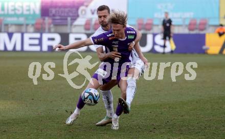 Fussball Bundesliga. SK Austria Klagenfurt gegen FC Blau Weiss Linz. Aaron Sky Schwarz,   (Klagenfurt),  Fabio Strauss (Linz).  Klagenfurt, am 25.2.2024.
Foto: Kuess
www.qspictures.net
---
pressefotos, pressefotografie, kuess, qs, qspictures, sport, bild, bilder, bilddatenbank