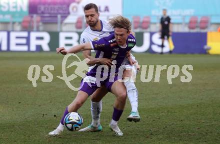 Fussball Bundesliga. SK Austria Klagenfurt gegen FC Blau Weiss Linz. Aaron Sky Schwarz,   (Klagenfurt),  Fabio Strauss (Linz).  Klagenfurt, am 25.2.2024.
Foto: Kuess
www.qspictures.net
---
pressefotos, pressefotografie, kuess, qs, qspictures, sport, bild, bilder, bilddatenbank