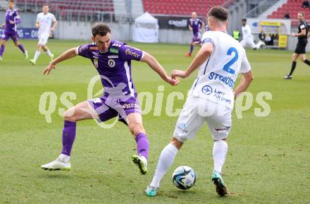 Fussball Bundesliga. SK Austria Klagenfurt gegen FC Blau Weiss Linz.  Andrew Irving,  (Klagenfurt),  Fabio Strauss (Linz).  Klagenfurt, am 25.2.2024.
Foto: Kuess
www.qspictures.net
---
pressefotos, pressefotografie, kuess, qs, qspictures, sport, bild, bilder, bilddatenbank