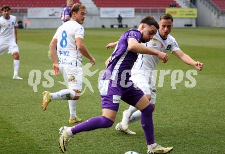 Fussball Bundesliga. SK Austria Klagenfurt gegen FC Blau Weiss Linz.  Sinan Karweina,  (Klagenfurt), Tobias Koch  (Linz).  Klagenfurt, am 25.2.2024.
Foto: Kuess
www.qspictures.net
---
pressefotos, pressefotografie, kuess, qs, qspictures, sport, bild, bilder, bilddatenbank