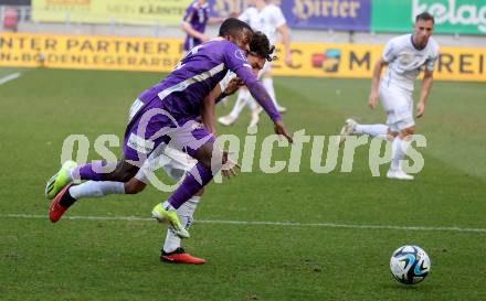 Fussball Bundesliga. SK Austria Klagenfurt gegen FC Blau Weiss Linz. Solomon Bonnah,  (Klagenfurt),   Joao Luiz Alves Soares (Linz).  Klagenfurt, am 25.2.2024.
Foto: Kuess
www.qspictures.net
---
pressefotos, pressefotografie, kuess, qs, qspictures, sport, bild, bilder, bilddatenbank