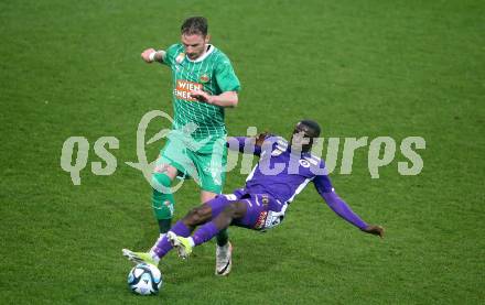 Fussball Bundesliga. SK Austria Klagenfurt gegen Rapid Wien.  Solomon Bonnah,  (Klagenfurt), Michaell Sollbauer (Rapid).  Klagenfurt, am 10.3.2024.
Foto: Kuess
www.qspictures.net
---
pressefotos, pressefotografie, kuess, qs, qspictures, sport, bild, bilder, bilddatenbank