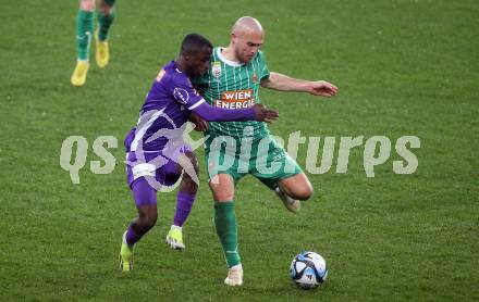 Fussball Bundesliga. SK Austria Klagenfurt gegen Rapid Wien.  Solomon Bonnah, (Klagenfurt), Lukas Grgic   (Rapid).  Klagenfurt, am 10.3.2024.
Foto: Kuess
www.qspictures.net
---
pressefotos, pressefotografie, kuess, qs, qspictures, sport, bild, bilder, bilddatenbank