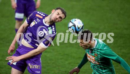 Fussball Bundesliga. SK Austria Klagenfurt gegen Rapid Wien.  Andrew Irving, (Klagenfurt),  Jonas Antonius Auer  (Rapid).  Klagenfurt, am 10.3.2024.
Foto: Kuess
www.qspictures.net
---
pressefotos, pressefotografie, kuess, qs, qspictures, sport, bild, bilder, bilddatenbank