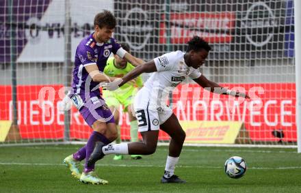 Fussball Bundesliga. SK Austria Klagenfurt gegen SK Puntigamer Sturm Graz.  Thorsten Mahrer,  (Klagenfurt), Seedy Jatta  (Graz).  Klagenfurt, am 17.3.2024.
Foto: Kuess
www.qspictures.net
---
pressefotos, pressefotografie, kuess, qs, qspictures, sport, bild, bilder, bilddatenbank