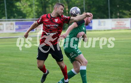 Fussball. Kaerntner Liga. Ferlach Atus gegen Lendorf.  Martin Posratschnig  (Ferlach), Christian Wernisch  (Lendorf).  Ferlach, 11.5.2024.
Foto: Kuess
www.qspictures.net
---
pressefotos, pressefotografie, kuess, qs, qspictures, sport, bild, bilder, bilddatenbank