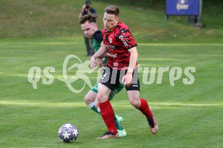 Fussball. Kaerntner Liga. Ferlach Atus gegen Lendorf.  Florian Verdel  (Ferlach),  Mario Rumbold (Lendorf).  Ferlach, 11.5.2024.
Foto: Kuess
www.qspictures.net
---
pressefotos, pressefotografie, kuess, qs, qspictures, sport, bild, bilder, bilddatenbank