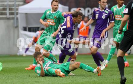 Fussball Bundesliga. SK Austria Klagenfurt gegen SK Rapid Wien.  Christopher Wernitznig,   (Klagenfurt), Guido Burgstaller   (Rapid).  Klagenfurt, am 12.5.2024.
Foto: Kuess
www.qspictures.net
---
pressefotos, pressefotografie, kuess, qs, qspictures, sport, bild, bilder, bilddatenbank