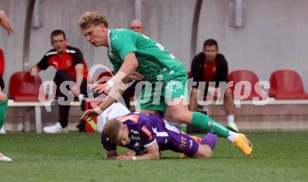 Fussball Bundesliga. SK Austria Klagenfurt gegen SK Rapid Wien. Christopher CVetko,     (Klagenfurt),  Leopold Querfeld (Rapid).  Klagenfurt, am 12.5.2024.
Foto: Kuess
www.qspictures.net
---
pressefotos, pressefotografie, kuess, qs, qspictures, sport, bild, bilder, bilddatenbank