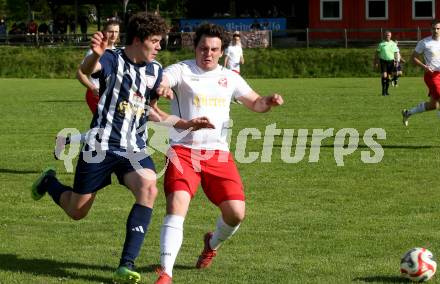 Fussball 2. KLasse C. Oberes Metnitztal gegen Strassburg. Patrick Strainer  (Metnitztal), 
Christian Schlintl   (Strassburg). Grades, am 18.5.2024.
Foto: Kuess
www.qspictures.net
---
pressefotos, pressefotografie, kuess, qs, qspictures, sport, bild, bilder, bilddatenbank