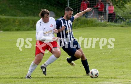 Fussball 2. KLasse C. Oberes Metnitztal gegen Strassburg. Thomas Guenther Steiger  (Metnitztal), Markus Tamegger   (Strassburg). Grades, am 18.5.2024.
Foto: Kuess
www.qspictures.net
---
pressefotos, pressefotografie, kuess, qs, qspictures, sport, bild, bilder, bilddatenbank