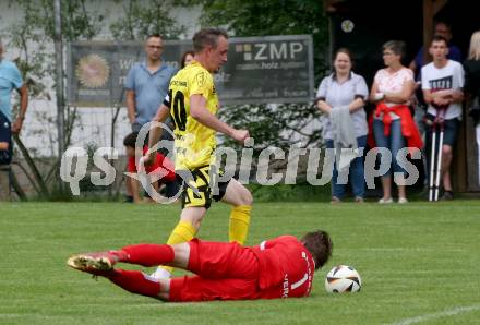 Fussball 1. Klasse D. Bad St. Leonhard gegen Eitweg . Patrick Schlacher   (Bad St. Leonhard),   Stefan Kucher (Eitweg ). St. Bad St. Leonhard, am 8.6.2024.
Foto: Kuess
www.qspictures.net
---
pressefotos, pressefotografie, kuess, qs, qspictures, sport, bild, bilder, bilddatenbank