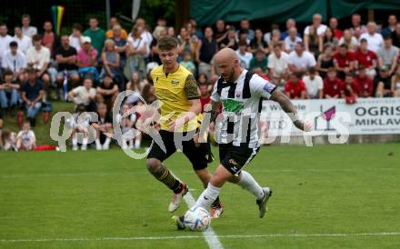 Fussball 1. Klasse C. Ludmannsdorf gegen Oberglan..  Said Djulic (Ludmannsdorf),  Niklas Julian Rainer (Oberglan). Ludmannsdorf, am 9.6.2024.
Foto: Kuess
www.qspictures.net
---
pressefotos, pressefotografie, kuess, qs, qspictures, sport, bild, bilder, bilddatenbank