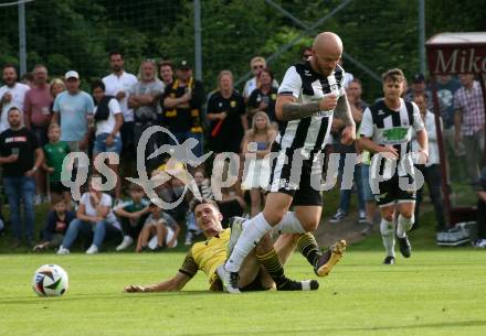 Fussball 1. Klasse C. Ludmannsdorf gegen Oberglan..  Said Djulic (Ludmannsdorf),  Gerald Kohlweg (Oberglan). Ludmannsdorf, am 9.6.2024.
Foto: Kuess
www.qspictures.net
---
pressefotos, pressefotografie, kuess, qs, qspictures, sport, bild, bilder, bilddatenbank