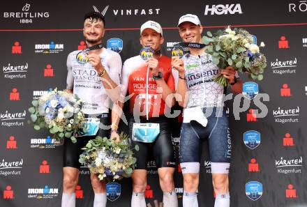 Ironman. Zieleinlauf. Arthur Horseau (FRA), Denis Chevrot (FRA), Jon Saeveraas Breivold (NOR).  Klagenfurt, 16.6.2024.
Foto: Kuess
---
pressefotos, pressefotografie, kuess, qs, qspictures, sport, bild, bilder, bilddatenbank