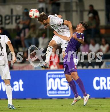 Fussball Bundesliga. WAC gegen SK Austria Klagenfurt.  Dominik Baumgartner,  (WAC), David Toshevski   (Klagenfurt).  Wolfsberg, am 3.8.2024.
Foto: Kuess
www.qspictures.net
---
pressefotos, pressefotografie, kuess, qs, qspictures, sport, bild, bilder, bilddatenbank