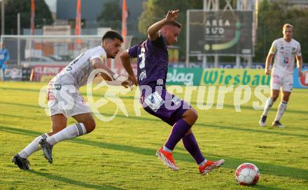 Fussball Bundesliga. WAC gegen SK Austria Klagenfurt.  Dejan Zukic (WAC), Tobias Koch  (Klagenfurt).  Wolfsberg, am 3.8.2024.
Foto: Kuess
www.qspictures.net
---
pressefotos, pressefotografie, kuess, qs, qspictures, sport, bild, bilder, bilddatenbank