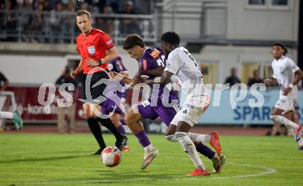 Fussball Bundesliga. WAC gegen SK Austria Klagenfurt.  David Atanga,  (WAC),   Ben Bobzien (Klagenfurt).  Wolfsberg, am 3.8.2024.
Foto: Kuess
www.qspictures.net
---
pressefotos, pressefotografie, kuess, qs, qspictures, sport, bild, bilder, bilddatenbank