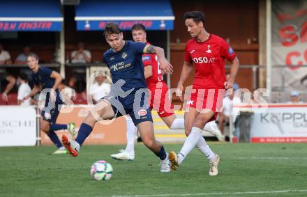 Fussball Kaerntner Liga. SAK gegen Velden. Sebastian Hertelt  (SAK),  Florijan Lampic (Velden). Welzenegg, am 10.8.2024.
Foto: Kuess
www.qspictures.net
---
pressefotos, pressefotografie, kuess, qs, qspictures, sport, bild, bilder, bilddatenbank