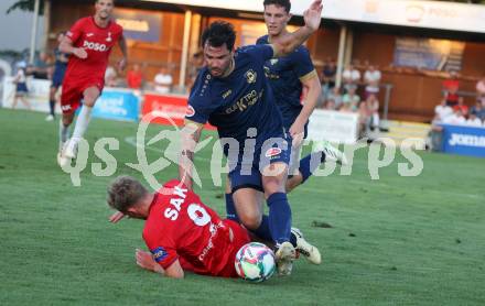 Fussball Kaerntner Liga. SAK gegen Velden.   Marjan Ogris-Martic (SAK), Roland Putsche  (Velden). Welzenegg, am 10.8.2024.
Foto: Kuess
www.qspictures.net
---
pressefotos, pressefotografie, kuess, qs, qspictures, sport, bild, bilder, bilddatenbank