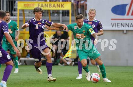 Fussball Bundesliga. SK Austria Klagenfurt gegen SK Rapid. Jannik Robatsch,  (Klagenfurt), Guido Burgstaller  (Rapid).  Klagenfurt, am 11.8.2024.
Foto: Kuess
www.qspictures.net
---
pressefotos, pressefotografie, kuess, qs, qspictures, sport, bild, bilder, bilddatenbank