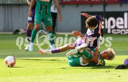 Fussball Bundesliga. SK Austria Klagenfurt gegen SK Rapid. Ben Bobzien, (Klagenfurt),  Moritz Oswald  (Rapid).  Klagenfurt, am 11.8.2024.
Foto: Kuess
www.qspictures.net
---
pressefotos, pressefotografie, kuess, qs, qspictures, sport, bild, bilder, bilddatenbank