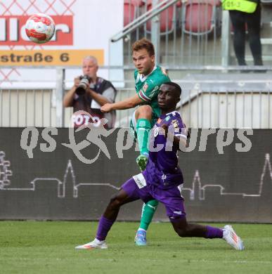 Fussball Bundesliga. SK Austria Klagenfurt gegen SK Rapid.  Solomon Bonnah, (Klagenfurt), Matthias Seidl   (Rapid).  Klagenfurt, am 11.8.2024.
Foto: Kuess
www.qspictures.net
---
pressefotos, pressefotografie, kuess, qs, qspictures, sport, bild, bilder, bilddatenbank