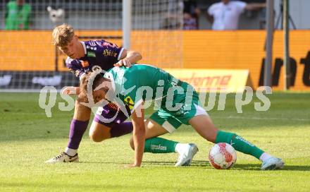 Fussball Bundesliga. SK Austria Klagenfurt gegen SK Rapid.  Jannik Robatsch,  (Klagenfurt), Dion Drena Beljo  (Rapid).  Klagenfurt, am 11.8.2024.
Foto: Kuess
www.qspictures.net
---
pressefotos, pressefotografie, kuess, qs, qspictures, sport, bild, bilder, bilddatenbank