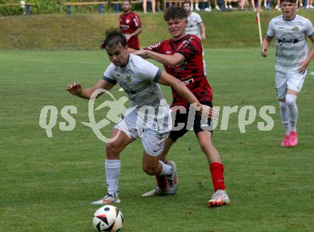 Fussball Kaerntner Liga. ATUS Ferlach gegen Koettmannsdorf.  Stefan Ebner (Ferlach),   Daniel Hans Genser (Koettmannsdorf). Ferlach, 14.8.2024.
Foto: Kuess
www.qspictures.net
---
pressefotos, pressefotografie, kuess, qs, qspictures, sport, bild, bilder, bilddatenbank