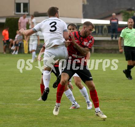 Fussball Kaerntner Liga. ATUS Ferlach gegen Koettmannsdorf.  Daniel Jobst (Ferlach),  Fabian Janschitz (Koettmannsdorf). Ferlach, 14.8.2024.
Foto: Kuess
www.qspictures.net
---
pressefotos, pressefotografie, kuess, qs, qspictures, sport, bild, bilder, bilddatenbank