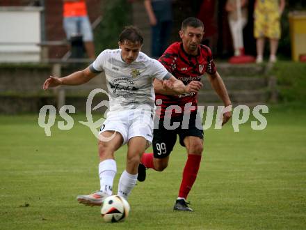 Fussball Kaerntner Liga. ATUS Ferlach gegen Koettmannsdorf.  Anel Mujkic (Ferlach),  Daniel Hans Genser (Koettmannsdorf). Ferlach, 14.8.2024.
Foto: Kuess
www.qspictures.net
---
pressefotos, pressefotografie, kuess, qs, qspictures, sport, bild, bilder, bilddatenbank