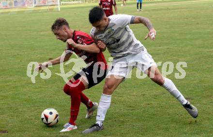 Fussball Kaerntner Liga. ATUS Ferlach gegen Koettmannsdorf. Jano Maria Candussi  (Ferlach),  Damjan Jovanovic (Koettmannsdorf). Ferlach, 14.8.2024.
Foto: Kuess
www.qspictures.net
---
pressefotos, pressefotografie, kuess, qs, qspictures, sport, bild, bilder, bilddatenbank