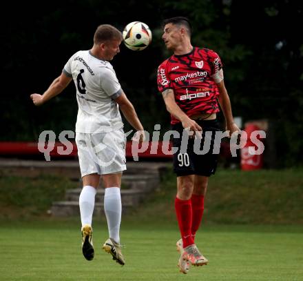 Fussball Kaerntner Liga. ATUS Ferlach gegen Koettmannsdorf.  Lukas Jaklitsch  (Ferlach), Michael Jakopitsch  (Koettmannsdorf). Ferlach, 14.8.2024.
Foto: Kuess
www.qspictures.net
---
pressefotos, pressefotografie, kuess, qs, qspictures, sport, bild, bilder, bilddatenbank